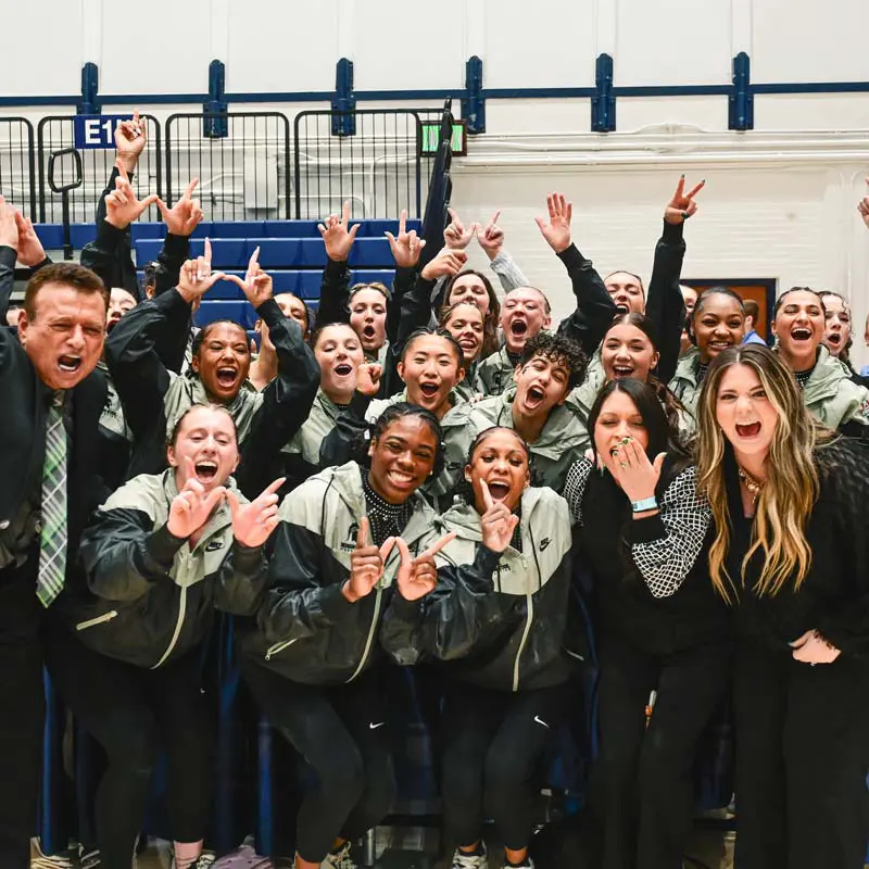 Men's tennis doubles champions celebrating their victory