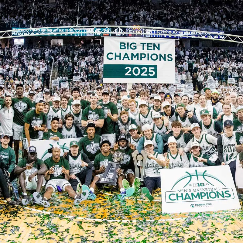 Men's tennis doubles champions celebrating their victory