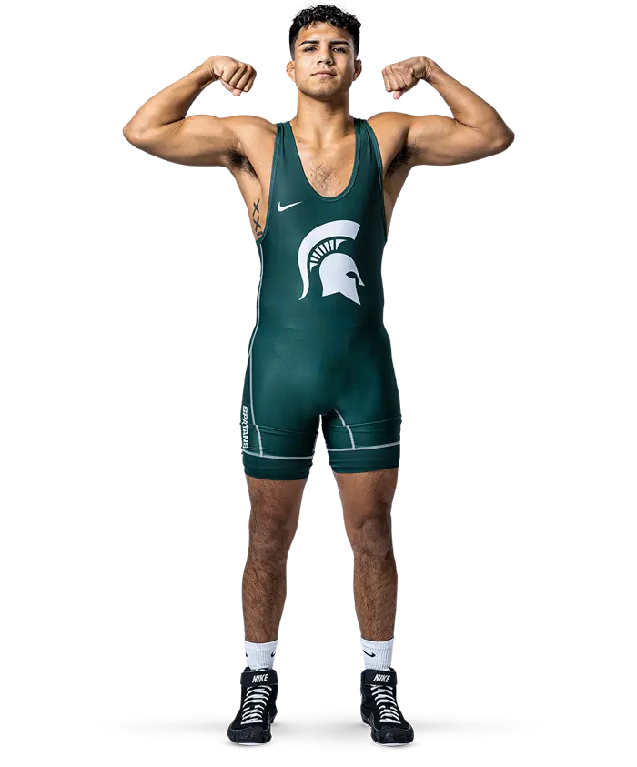 baseball player posing with bat