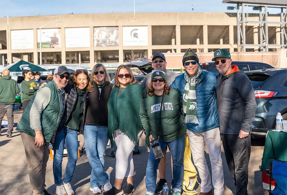 Men and women smiling